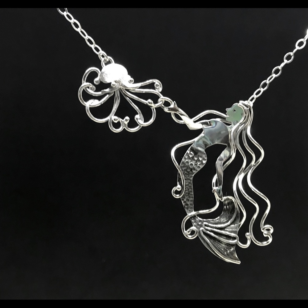 Octopus and mermaid necklace in sterling silver.